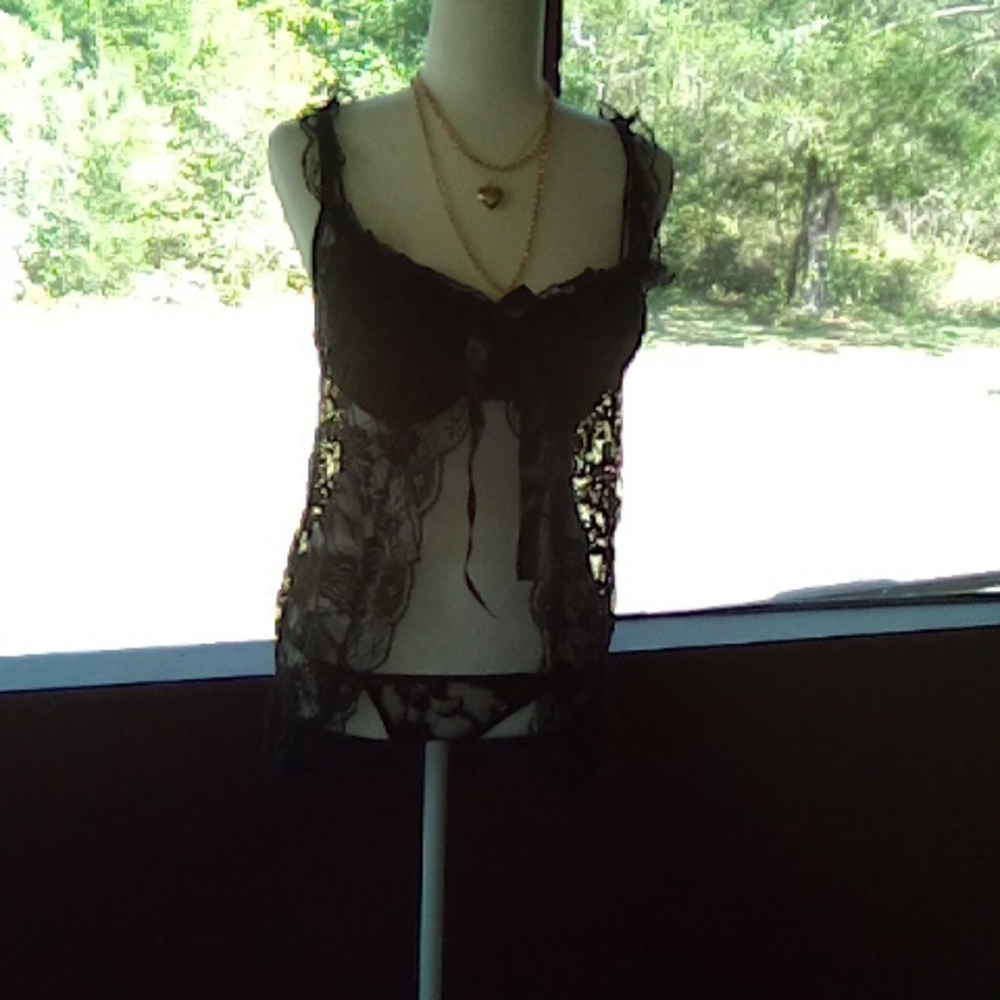 A black lace see through sexy nighty with G String panties 2XL runs small.